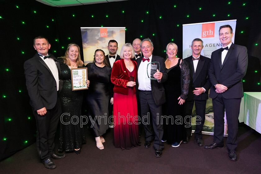 AWA 123 
 South West Farmer awards night 2023 at the Somerset County Cricket Club, Taunton Pictured The Darke family take home the South West Farmer of The Year award presented by NFUM - Nick Turner, NFU Mutual CEO