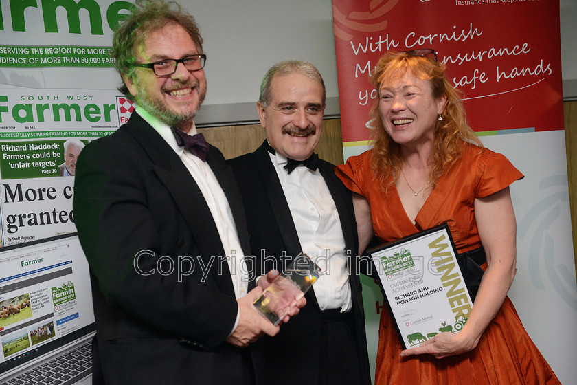 farming-awards-2017 20171102 0129 
 The South West Farmer Awards 2017 at Somerset County Cricket Club, Taunton. Pictured Winners of the Outstanding Achievment Award . L-R Richard Harding, Sponsor Alan Goddard and Fionagh Harding